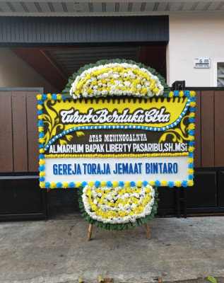 Papan Bunga Duka di Makawidey